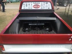 Under the cover is the compressor and pressure tank for the air ride system