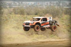 AIRAID-sponsored Jeremy McGrath jumping through the air in his Pro 2 at Geln Helen